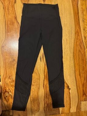 Lululemon Black high waisted Leggings with transparent leg parts size 4